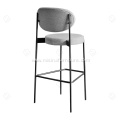 Faux leather upholstered metal frame bar stool